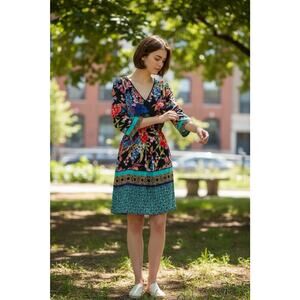 This item is a Dream Daily mixed print V-neck flowy shift dress